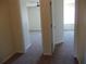 Hallway with carpet and access to bedrooms at 52 Providence Oak Ct, Lawrenceville, GA 30046