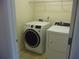 Laundry room with washer and dryer at 52 Providence Oak Ct, Lawrenceville, GA 30046