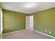 Bedroom with carpet flooring, olive green paint, and white trim at 4311 Clairesbrook Ln, Acworth, GA 30101