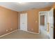 Bedroom with carpet, closet and view to hallway at 4311 Clairesbrook Ln, Acworth, GA 30101