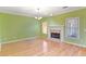 Spacious living room with hardwood floors and fireplace at 4311 Clairesbrook Ln, Acworth, GA 30101