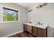 Elegant bathroom with double vanity and hardwood floors at 2873 Sylvan Rd, East Point, GA 30344