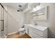 Modern bathroom with white vanity and walk-in shower at 2873 Sylvan Rd, East Point, GA 30344