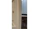 Bright bathroom with white shower and dark wood vanity and medicine cabinet at 31 N Broad N St, Porterdale, GA 30014