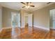 Bedroom with hardwood floors, neutral paint, and closet at 31 N Broad N St, Porterdale, GA 30014
