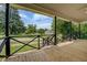 Beautiful porch showing a view of the neighborhood at 31 N Broad N St, Porterdale, GA 30014
