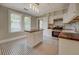 This beautiful kitchen features a butcher block island and stainless steel appliances at 31 N Broad N St, Porterdale, GA 30014