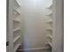 Walk-in pantry features built-in shelving providing ample storage at 31 N Broad N St, Porterdale, GA 30014