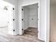 View of a hallway and doorways leading to other rooms in the house at 727 Copper Trace Way, Woodstock, GA 30189