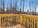 Wood deck offers an excellent view of the surrounding trees and landscape at 727 Copper Trace Way, Woodstock, GA 30189