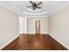 Bright bedroom with hardwood floors and access to bathroom at 255 Kendemere Pointe, Roswell, GA 30075