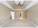 Bright bedroom with ceiling fan and access to hall bathroom at 255 Kendemere Pointe, Roswell, GA 30075