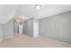 Large bedroom with gray walls, carpet flooring, and ample closet space at 255 Kendemere Pointe, Roswell, GA 30075