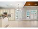 Bright dining area with access to the backyard through French doors at 255 Kendemere Pointe, Roswell, GA 30075