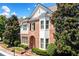 Two story home with brick and siding exterior at 255 Kendemere Pointe, Roswell, GA 30075