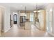 Open concept kitchen with island and view of entryway at 255 Kendemere Pointe, Roswell, GA 30075