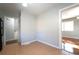 Small kitchenette area featuring tile flooring and view into the other rooms of the home at 2020 Kenwood Se Pl, Smyrna, GA 30082