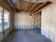 Unfinished basement room with insulation and a window at 4345 Easter Lily Ave Lot#83, Buford, GA 30518