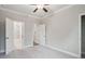 Empty bedroom with carpet, walk-in closet and bathroom at 5133 Greenard Watson Lane, Buford, GA 30518