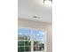 Double hung window with view of blue skies and trees at 5133 Greenard Watson Lane, Buford, GA 30518