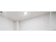 A bright white ceiling with vents and modern light fixture at 5133 Greenard Watson Lane, Buford, GA 30518