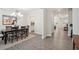Elegant dining room with wood floors, chandelier, and dining table with seating at 5133 Greenard Watson Lane, Buford, GA 30518