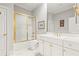 Clean bathroom with white cabinets and gold fixtures at 3657 Peachtree Ne Rd # 2C, Atlanta, GA 30319