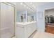 Bathroom boasts double vanity, a shower, and access to a walk-in closet at 3657 Peachtree Ne Rd # 2C, Atlanta, GA 30319