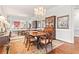 Elegant dining room with hardwood floors, chandelier, and antique furniture at 3657 Peachtree Ne Rd # 2C, Atlanta, GA 30319