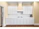 White kitchen with gas cooktop and ample counter space at 3657 Peachtree Ne Rd # 2C, Atlanta, GA 30319