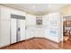 Spacious kitchen with white cabinets, stainless steel appliances, and hardwood floors at 3657 Peachtree Ne Rd # 2C, Atlanta, GA 30319