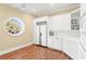 Bright kitchen with white cabinets, stainless steel appliances, and hardwood floors at 3657 Peachtree Ne Rd # 2C, Atlanta, GA 30319