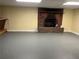 Basement featuring a brick fireplace at 6595 Malvin Dr, Austell, GA 30168