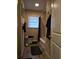 Bathroom with shower-tub combination and window at 5910 Lakeshore Se Dr, Mableton, GA 30126