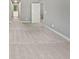 Bedroom with carpet and natural light. Features a view of an ensuite bath at 60 Hammock Dr, Covington, GA 30016