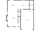 Layout of the home with living room, dining area, kitchen, garage, and half-bath off staircase at 60 Hammock Dr, Covington, GA 30016