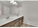 Bathroom features a dual sink vanity, and wood-look flooring at 147 Stargaze Rdg, Canton, GA 30114