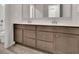Bathroom features a dual sink vanity, and wood-look flooring at 147 Stargaze Rdg, Canton, GA 30114