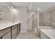 Bathroom features a dual sink vanity, a shower, and a soaking tub at 147 Stargaze Rdg, Canton, GA 30114