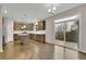 Modern kitchen with stainless steel appliances, island, and hardwood flooring at 147 Stargaze Rdg, Canton, GA 30114