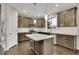 Updated kitchen with stainless appliances, island, and plenty of counter space at 147 Stargaze Rdg, Canton, GA 30114