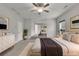 Stylish main bedroom includes bedroom furniture, neutral tones, and steps leading to another room at 147 Stargaze Rdg, Canton, GA 30114