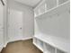 Convenient mudroom with built-in storage, hooks, and bench seating near door at 147 Stargaze Rdg, Canton, GA 30114