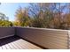 Deck shows wooded area with a mix of fall colors from surrounding trees at 811 Wynnes Ridge Se Cir, Marietta, GA 30067