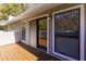 Balcony with wood flooring and sliding doors to the interior living space at 811 Wynnes Ridge Se Cir, Marietta, GA 30067