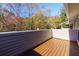 Private wooden deck showcasing a view of the surrounding wooded area at 811 Wynnes Ridge Se Cir, Marietta, GA 30067