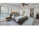 Spacious bedroom with large windows and wood platform bed at 811 Wynnes Ridge Se Cir, Marietta, GA 30067