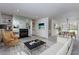 Bright living room with fireplace, built-in shelving, and contemporary furnishings at 811 Wynnes Ridge Se Cir, Marietta, GA 30067