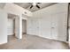 Spacious bedroom with multiple closets, plush carpet, and modern ceiling at 563 Memorial Se Dr # 503, Atlanta, GA 30312