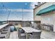 Rooftop deck with outdoor grill, kitchen, and dining area at 563 Memorial Se Dr # 503, Atlanta, GA 30312